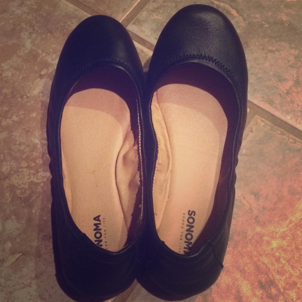 Black leather ballet flats